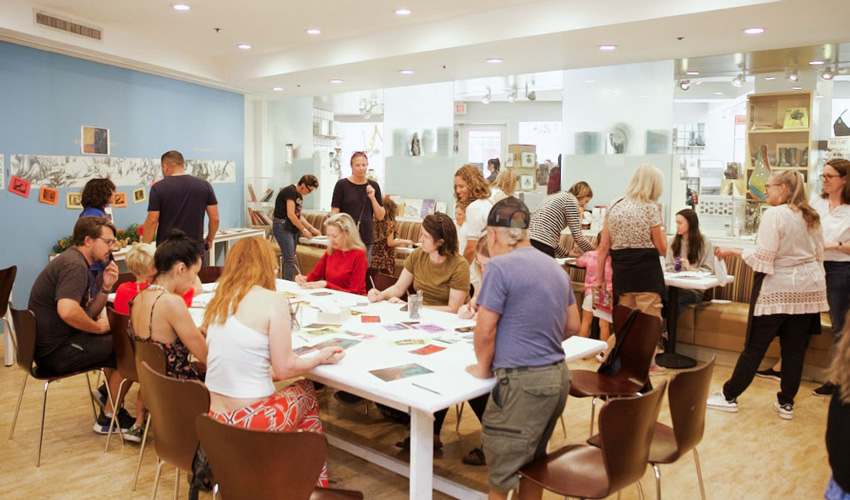 Photo of group of adults crafting