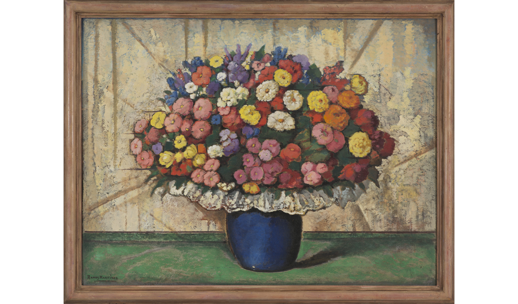 still life of a bouquet of flowers in a blue vase on a green table against a cream backdrop