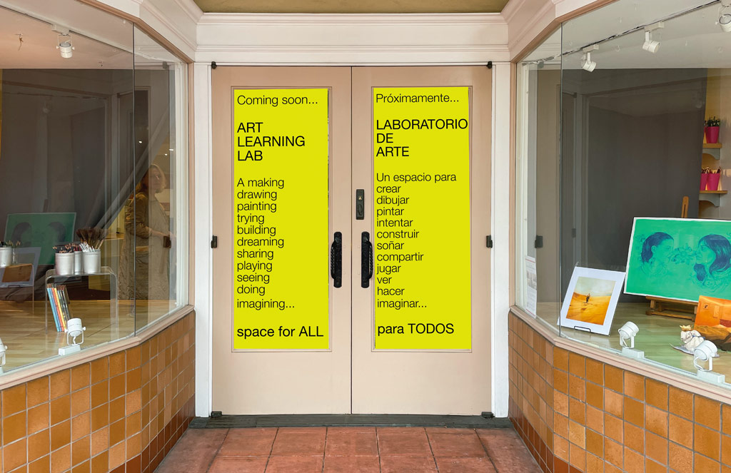 mockup of entrance to the new Art Learning Lab doors and signage, flanked by windows and art displays