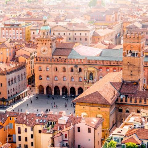 Aerial cityscape view from the tower on Bologna old town center with Maggiore square in Italy iStock-596076562