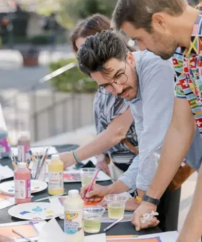 photograph of educators working on crafts outside