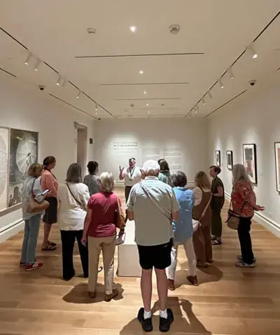 photo of a tour given to a group of visitors in the museum's interior