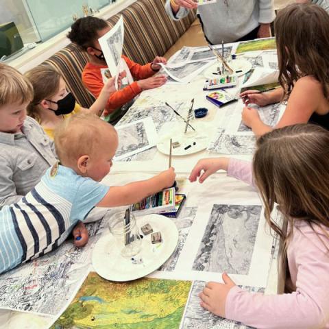 Photo of kids crafting at a table