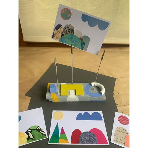 photo of crafting examples including cardboard cutouts on white paper