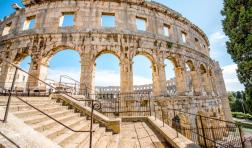 Architectural fragment of ancient roman amphitheatre in Pula city in Croatia.