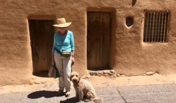 SBMA Traveler Jan Everote in front of the oldest building in Santa Fe